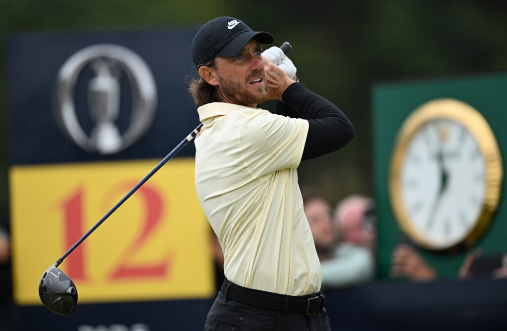 Tommy Fleetwood hits his tee shot on the 12th hole at The Open
