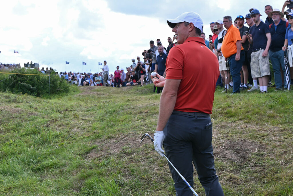 Rory McIlroy reacts to his approach shot during the third round of The Open Championship at Royal Portrush