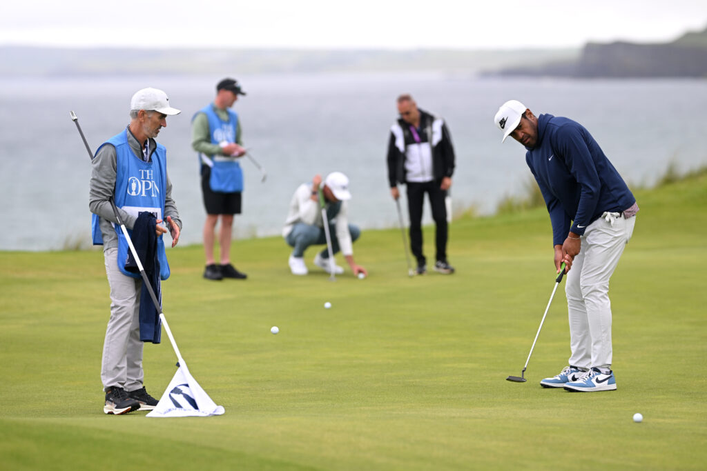 Tony Finau putts on the practice green prior to The Open Championship