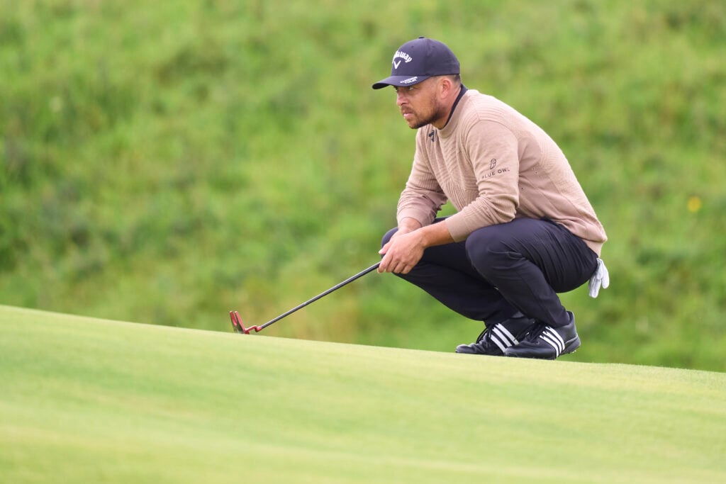 Xander Schauffele lines up a putt during the first round of The Open Championship at Royal Portrush