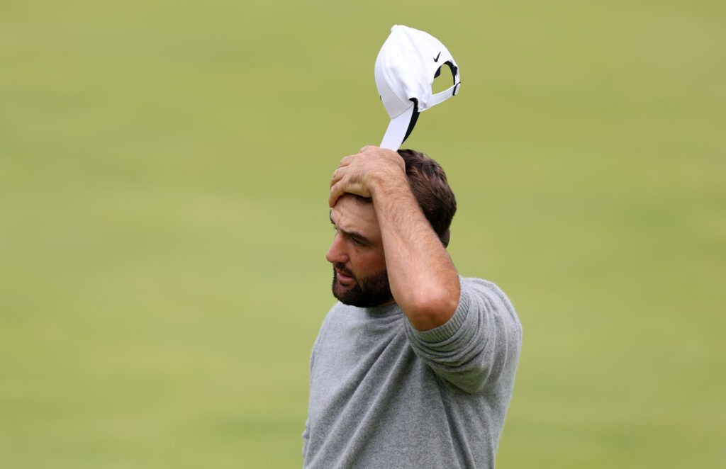 Scottie Scheffler standing on the 18th green during round one of The Open Championship