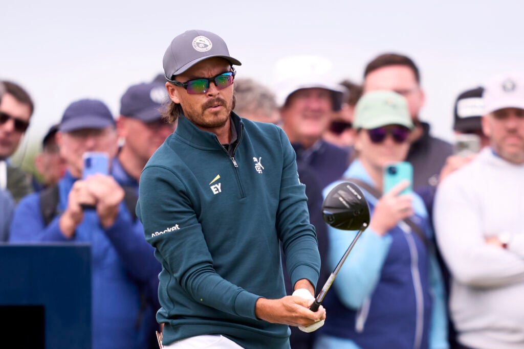 Rickie Fowler hits his tee shot on the 14th hole during round two of The Open