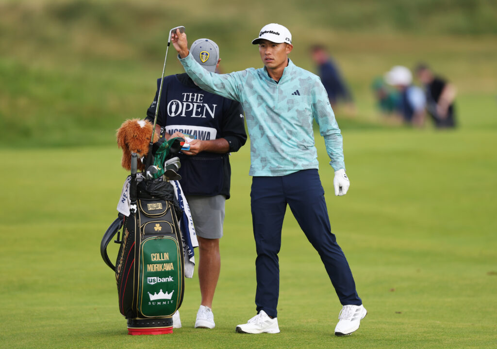 Collin Morikawa and his caddie Billy Foster on the 15th fairway during day two of The Open Championship