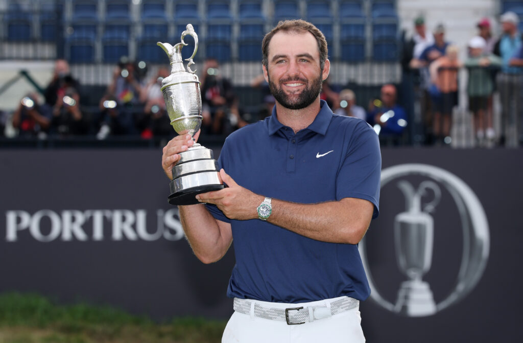 Scottie Scheffler holds aloft the Claret Jug after winning The 153rd Open Championship