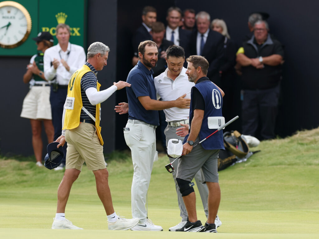 Scottie Scheffler and Haotong Li embrace after the final round of The Open Championship at Royal Portrush