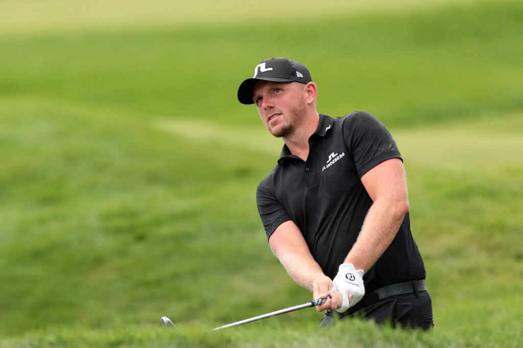 Matt Wallace plays a shot on the 18th hole during the final round of the 3M Open
