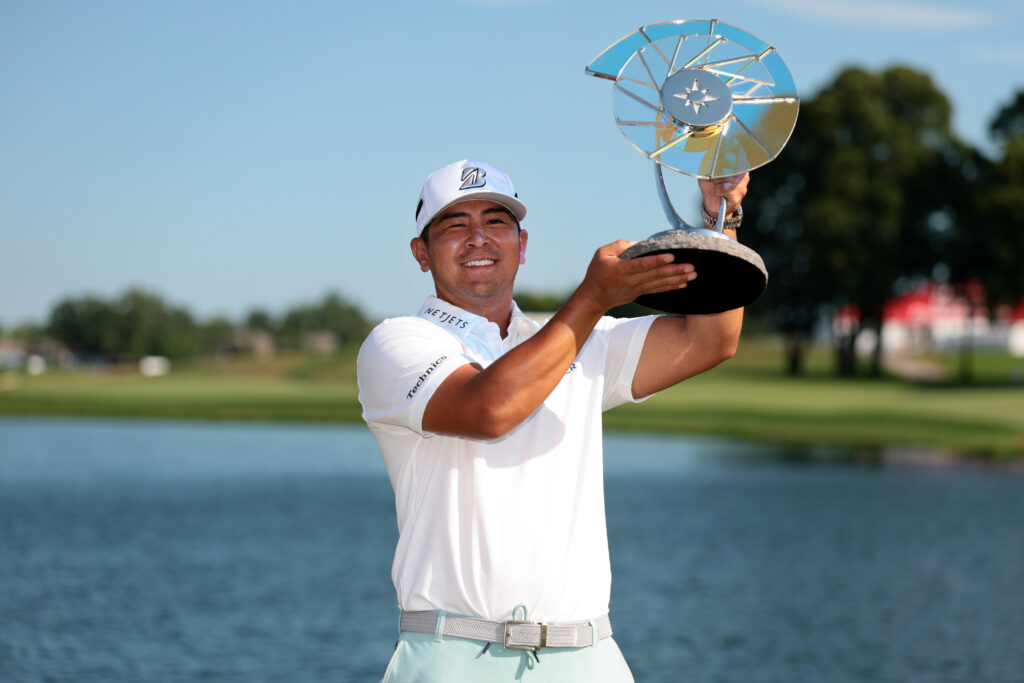 Kurt Kitayama poses with the 3M Open trophy at TPC Twin Cities