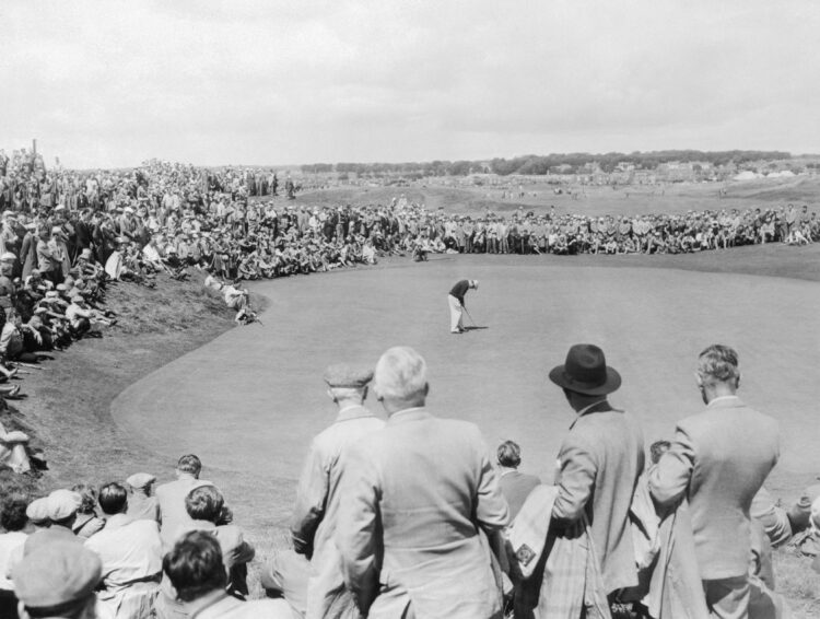 (Original Caption) Ben Hogan, winner of the British Open Golf Championship, is shown putting on No.2 green during his game with Ugo Grappasoni of I...