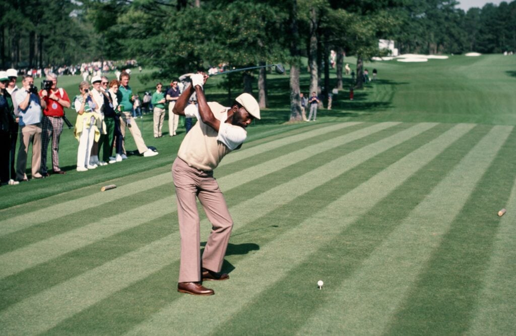 Calvin Peete tees off during the 1987 Masters Tournament at Augusta National Golf Club