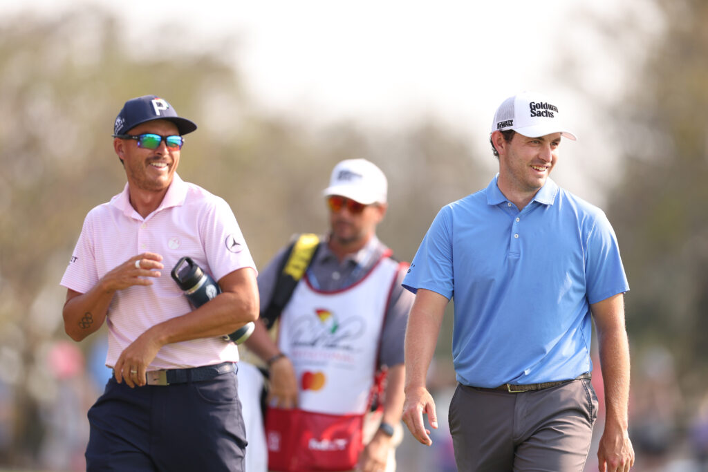 Rickie Fowler walks alongside Patrick Cantlay during the Arnold Palmer Invitational in 2023