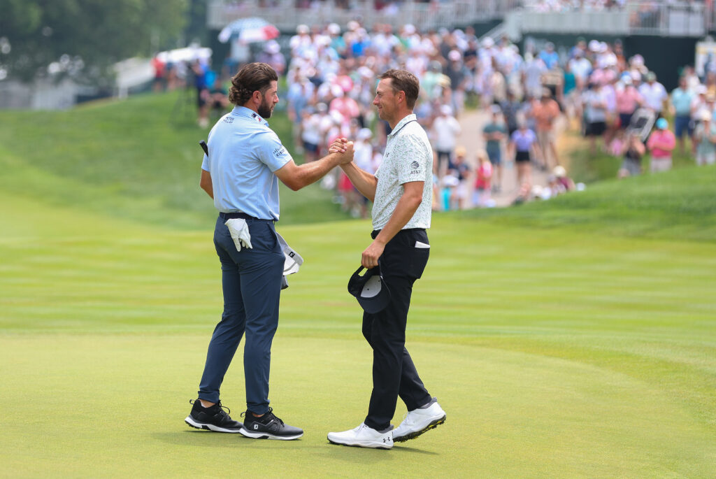 Jordan Spieth congratulates Cameron Young after his 59 at Travelers Championship