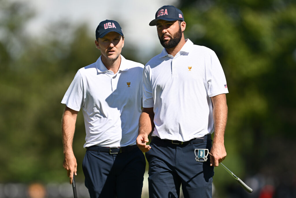 Scottie Scheffler chats with Russell Henley during the first day at the 2024 Presidents Cup