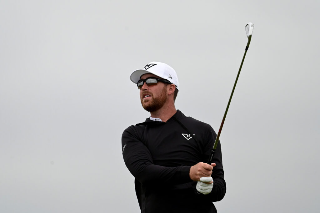 Andy Ogletree hits an approach shot at West Lancashire during Open qualifying