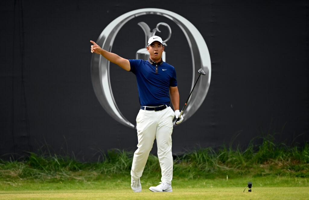 Tom Kim reacts to a wayward drive during the first round of The Open Championship at Royal Portrush