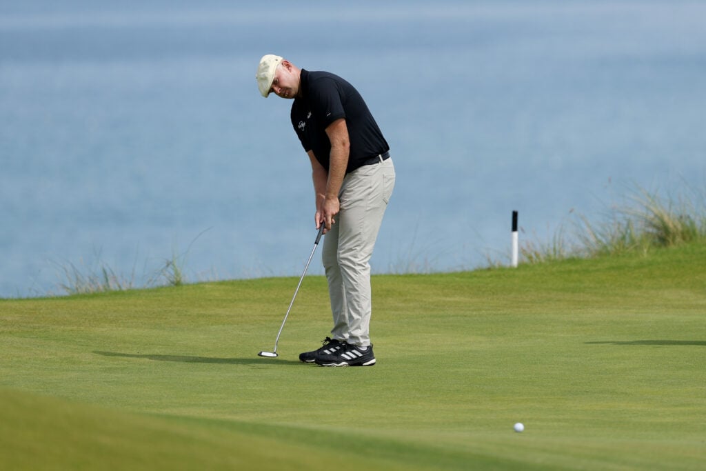 Harry Hall hits a putt during the final round of The Open Championship at Royal Portrush