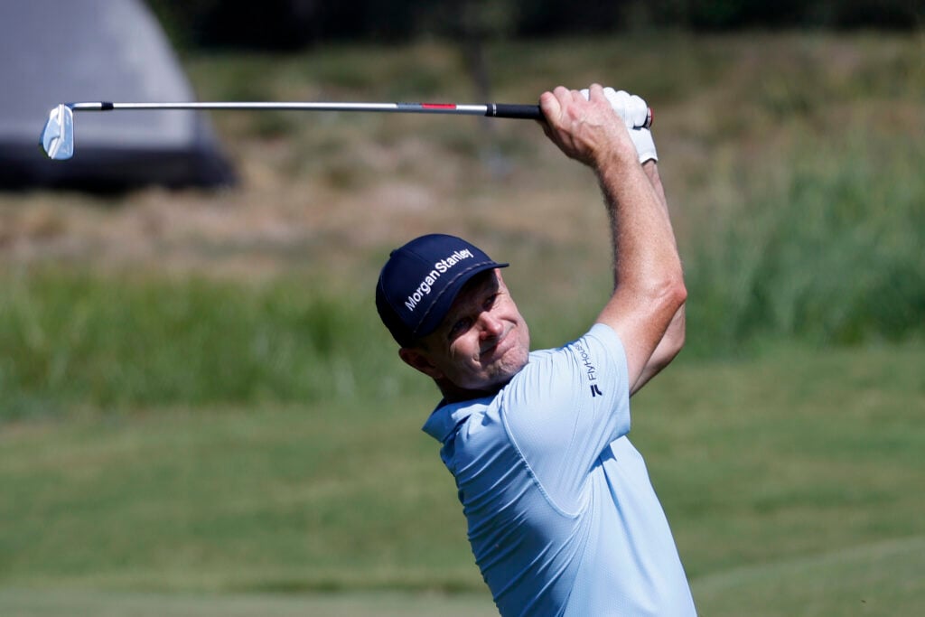 Justin Rose hits an approach shot during the opening round of the FedEx St. Jude Championship
