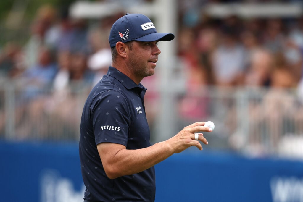 Gary Woodland acknowledges the crowd during the final round of the Wyndham Championship
