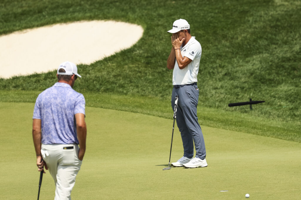 Collin Morikawa reacts to missing a putt during the second round of the BMW Championship
