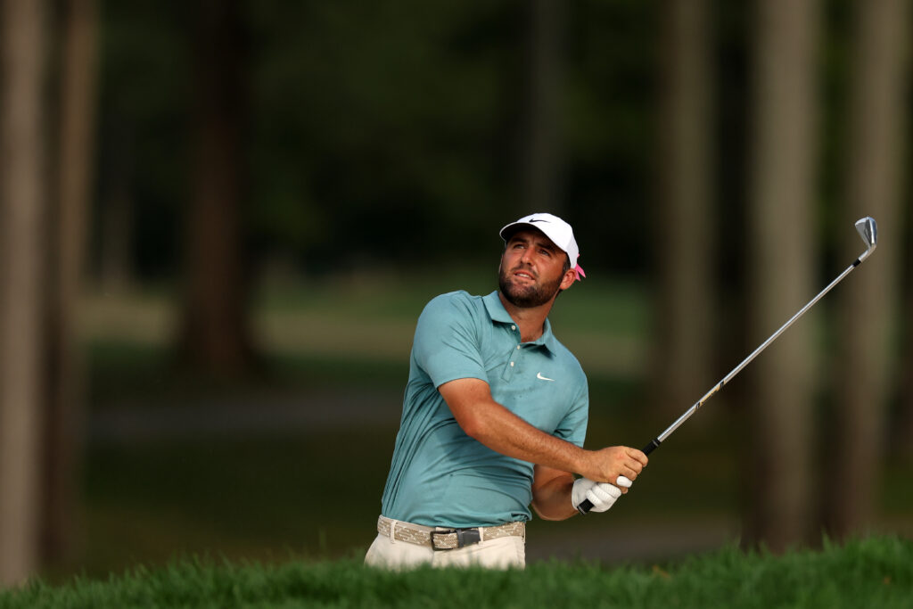 Scottie Scheffler watches his approach during the final round at the BMW Championship at Caves Valley