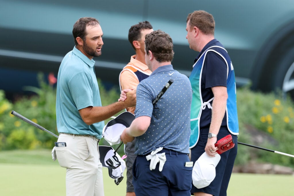 Scottie Scheffler and Robert MacIntyre shake hands after the final round of the BMW Championship