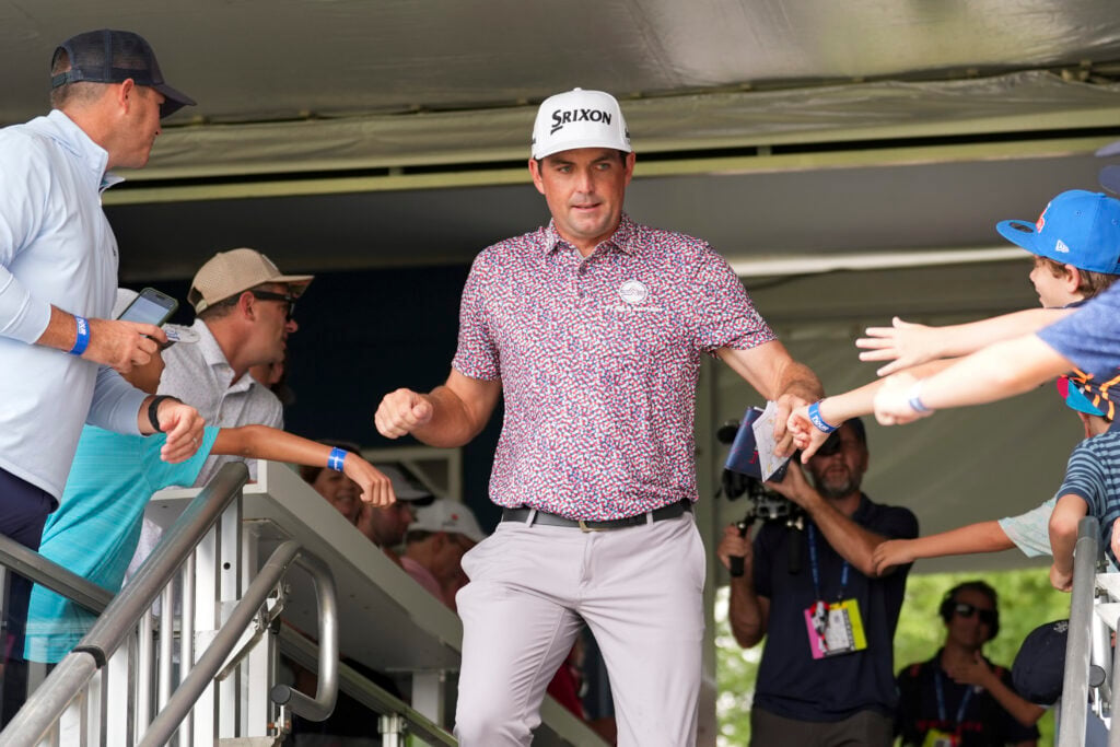 Keegan Bradley walks past fans ahead of the final round of the Tour Championship