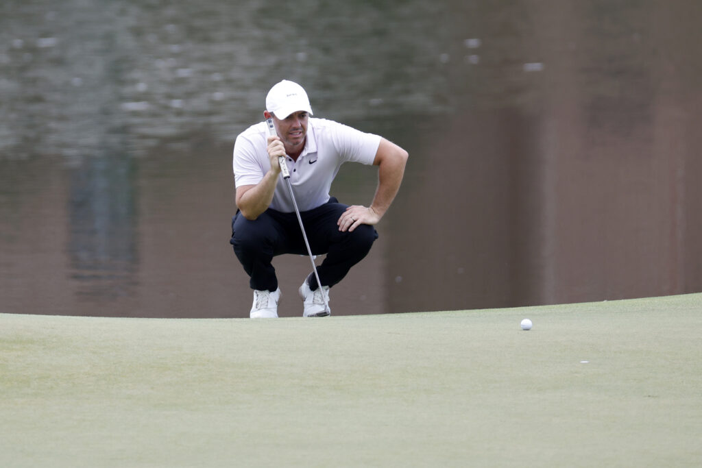 Rory McIlroy lines up a putt during the final round of the Tour Championship