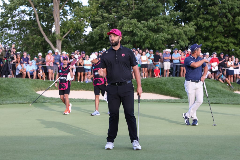 Jon Rahm celebrates holing his putt during the playoff at the LIV Golf Team Championship