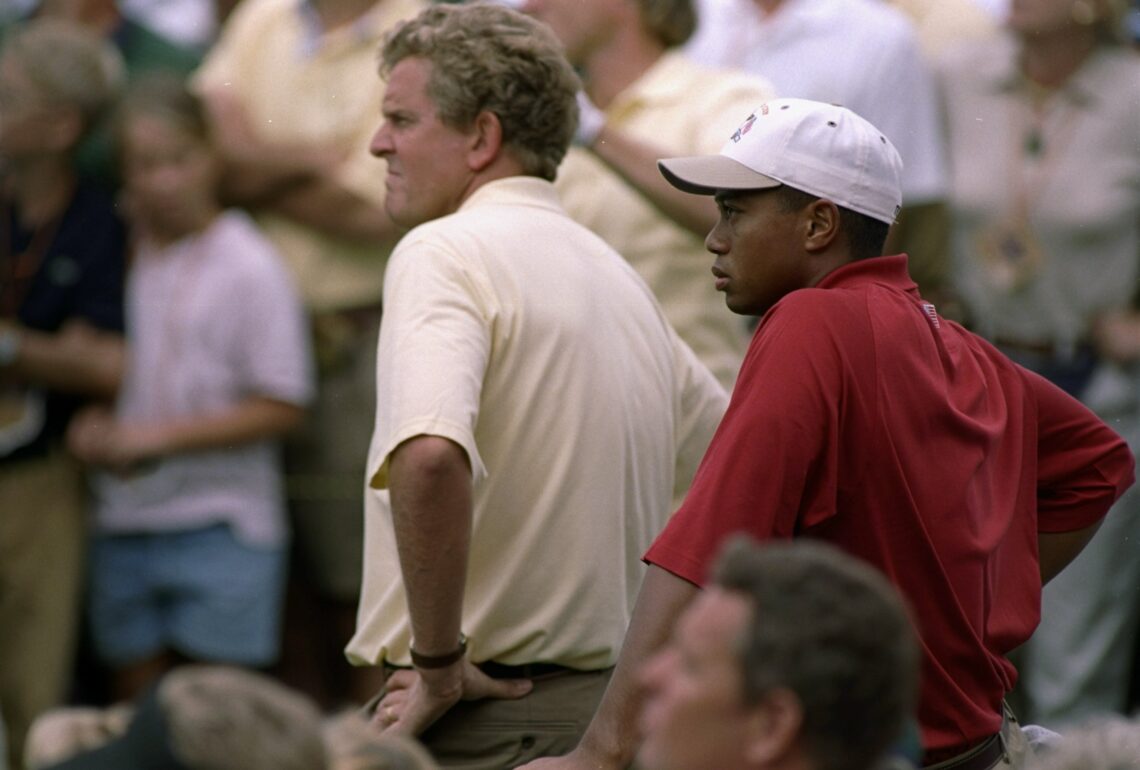26 Sep 1997:  Tiger Woods, right, stands with Colin Montgomerie during the Ryder Cup at the Valderrama Country Club in Spain. Mandatory Credit: Cra...