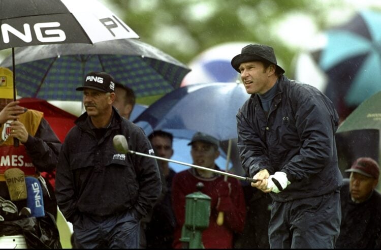 13 May 1999:  Nick Faldo of England is watched by Mark James during the Benson and Hedges International Open at the Oxfordshire GC in Thame, Englan...