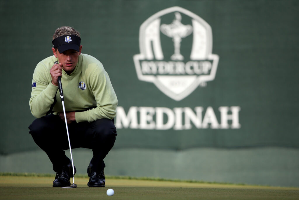 Luke Donald of Europe lines up a putt at the 2012 Ryder Cup