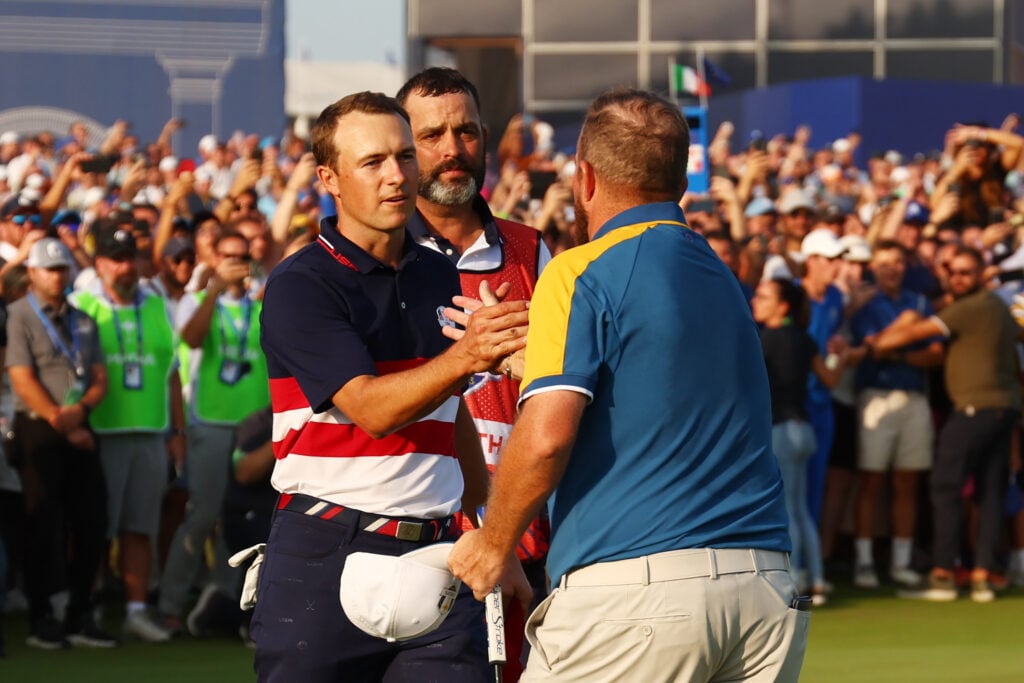 Jordan Spieth and Shane Lowry shake hands after their singles match at the 2023 Ryder Cup