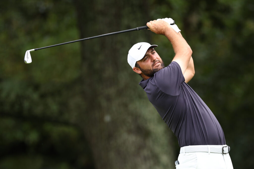 Scottie Scheffler of the United States plays his shot from the third tee during the third round of the TOUR Championship 2025 at East Lake