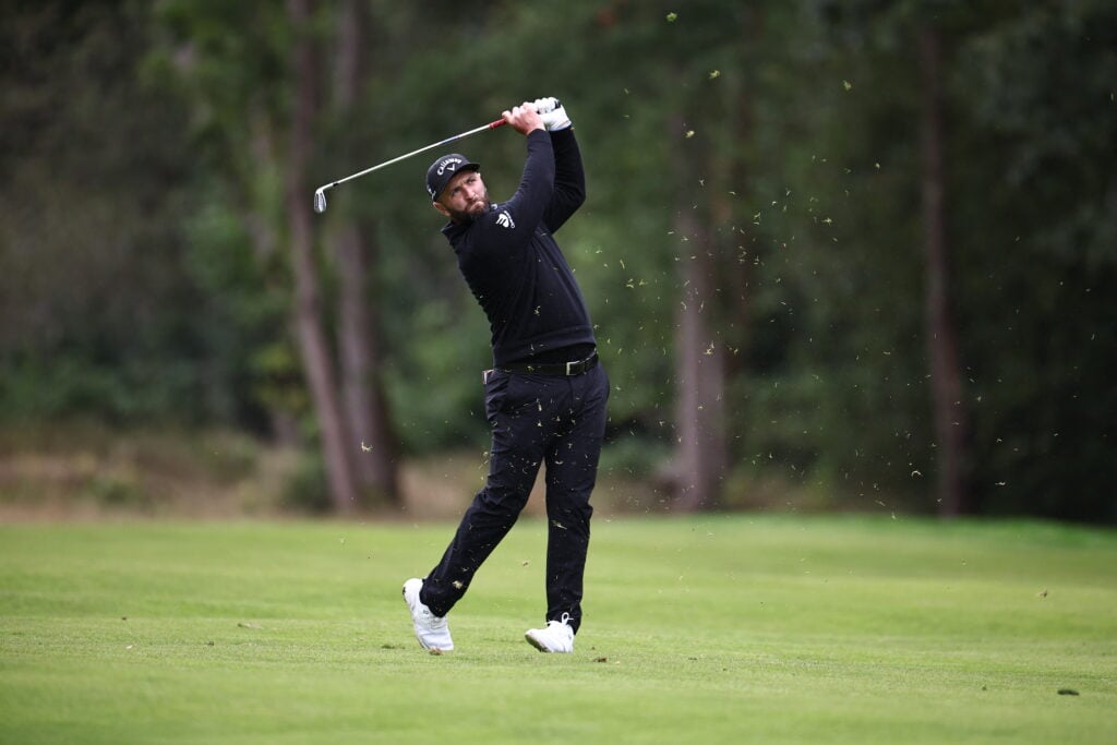 Jon Rahm plays a shot on the 16th on the fourth day of the BMW PGA Championship