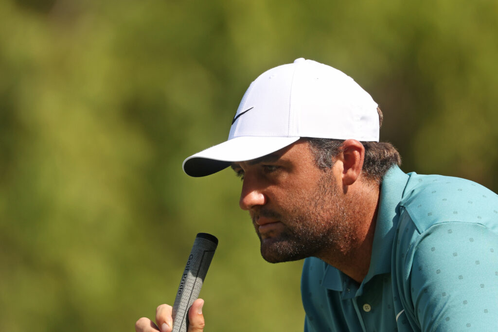 Scottie Scheffler lines up a putt during the first round of the Procore Championship