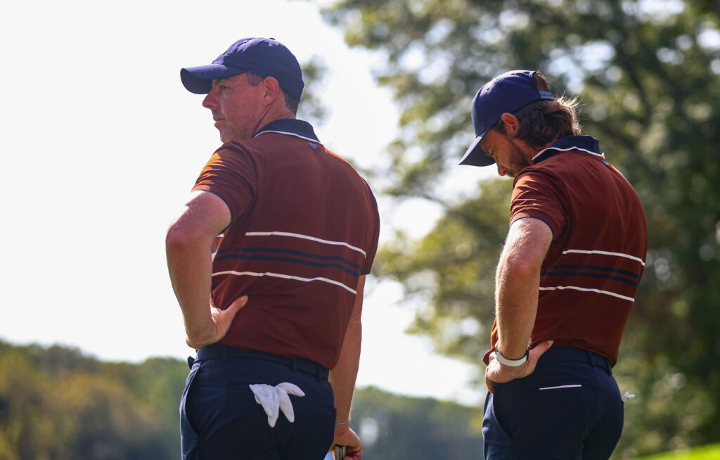 Rory McIlroy and Tommy Fleetwood look on during their foursomes match on Saturday morning at the Ryder Cup