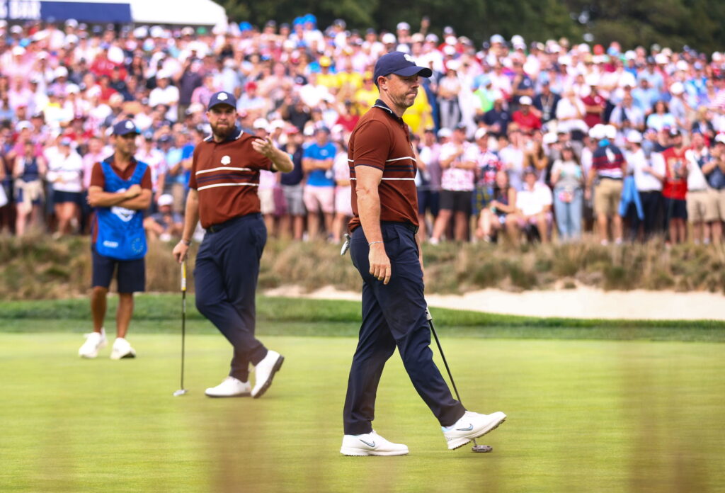Rory McIlroy waits to putt due to noise from the fans at the 2025 Ryder Cup
