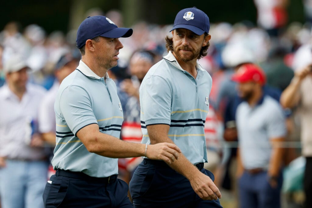 Rory McIlroy and Tommy Fleetwood during their match in the opening session at the Ryder Cup