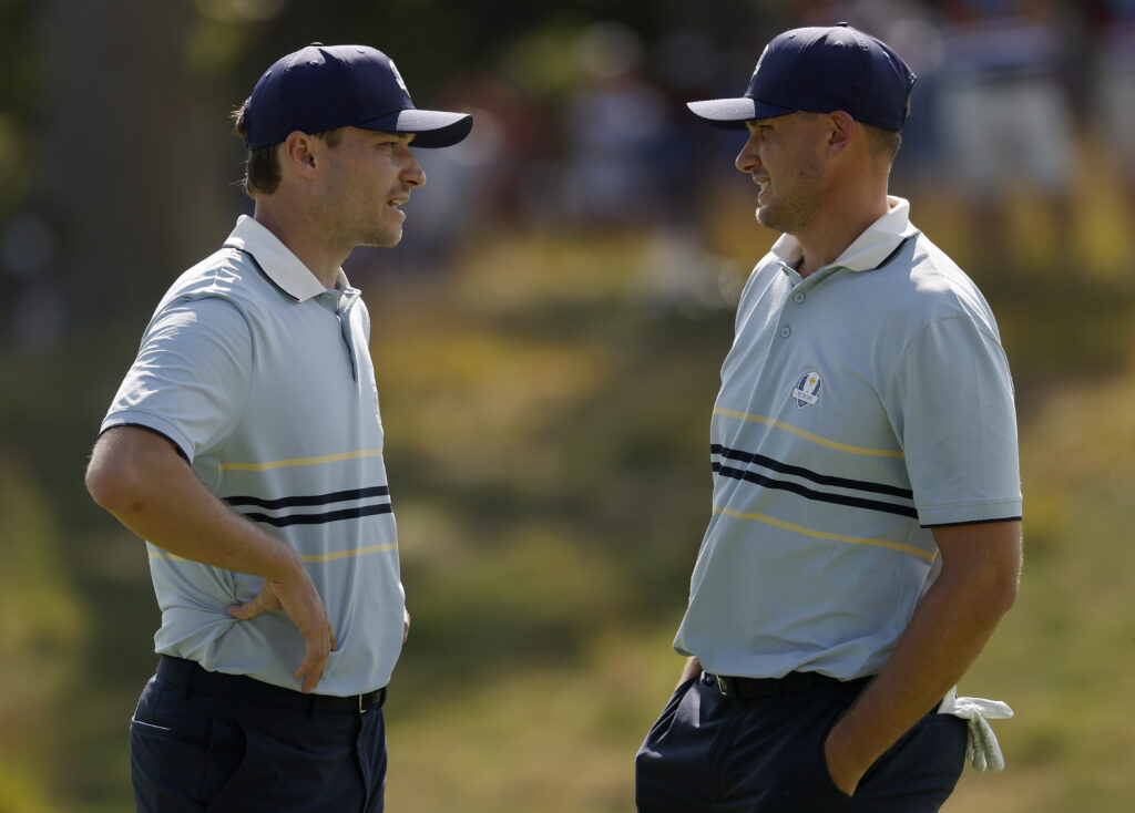 Ludvig Aberg and Rasmus Hojgaard in discussion during the fourballs at the Ryder Cup