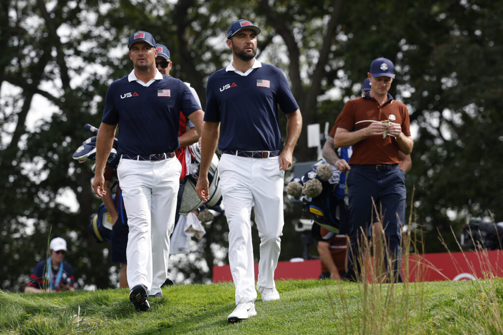 Scottie Scheffler walks ahead of Bryson DeChambeau on day two of the Ryder Cup