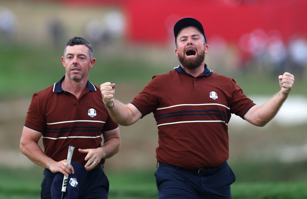 Rory McIlroy and Shane Lowry celebrate defeating Justin Thomas and Cameron Young at the Ryder Cup