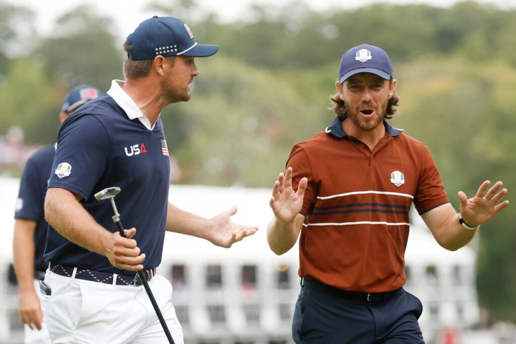 Tommy Fleetwood of Team Europe and Bryson DeChambeau of Team United States exchange words at the 2025 Ryder Cup.