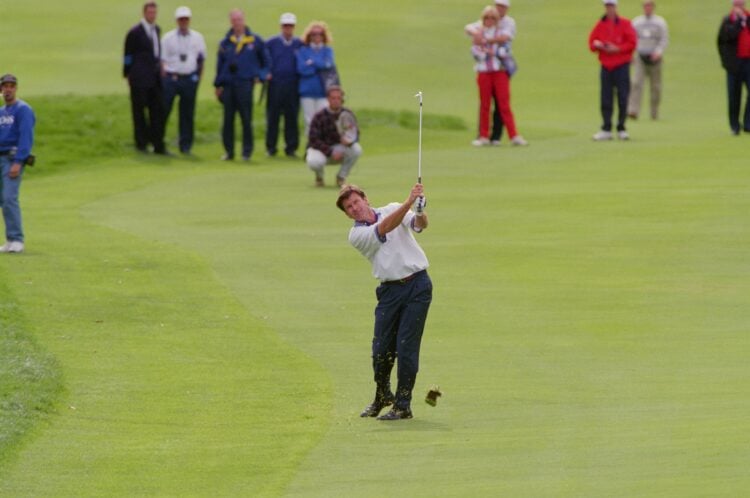 24 Sep 1995:  Nick Faldo of Europe plays a great approach on the 18th to set up victory in his final day singles match during the Ryder Cup at Oak ...