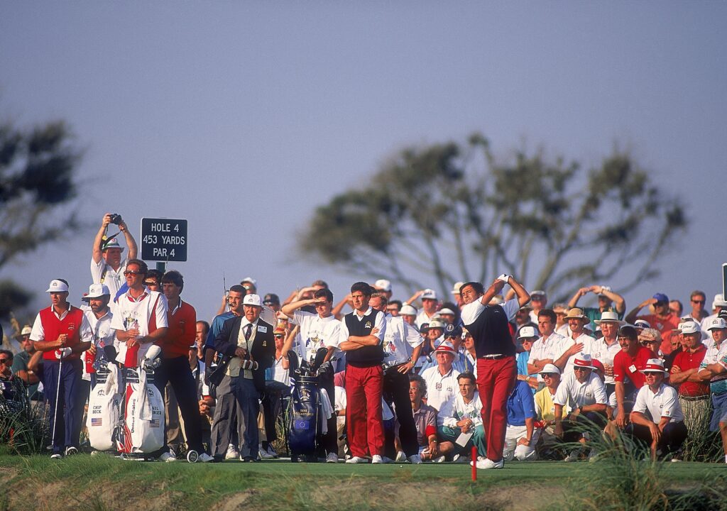 Seve Ballesteros tees off on the 4th hole in front of his partner Jose Maria Olazabal and USA team pairing Paul Azinger and Chip Beck on Day One of the Ryder Cup at Kiawah Island