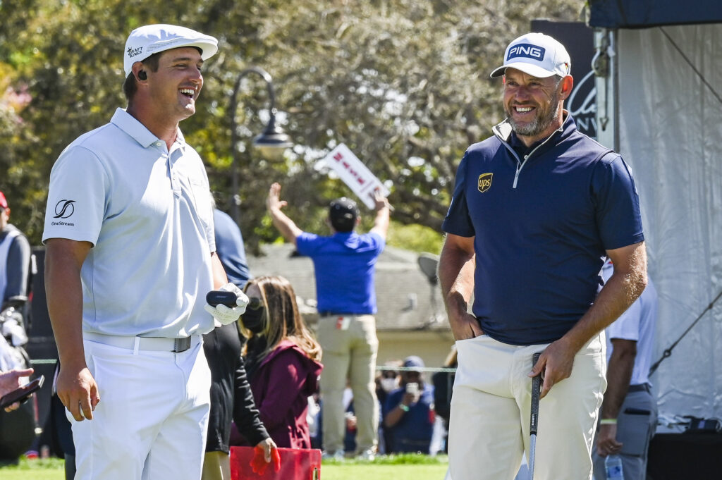 Bryson DeChambeau and Lee Westwood smile on the first tee during the final round of the Arnold Palmer Invitational