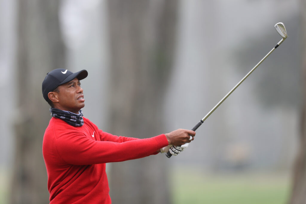 Tiger Woods hits an approach shot during the final round of the 2020 PGA Championship