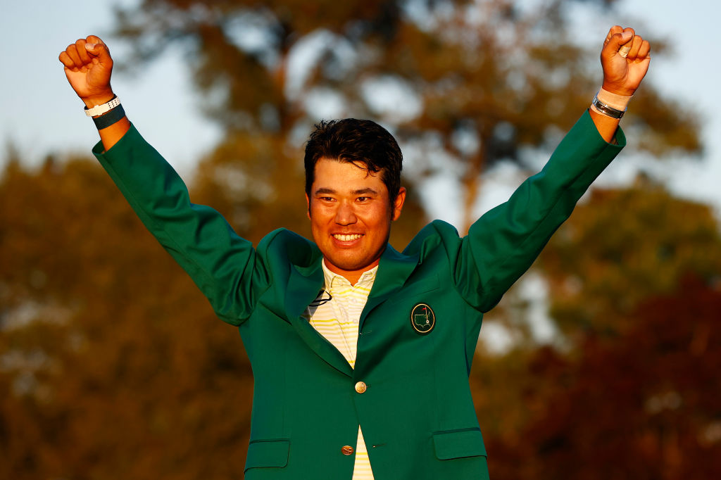 Hideki Matsuyama of Japan celebrates during the Green Jacket Ceremony after winning the Masters at Augusta National