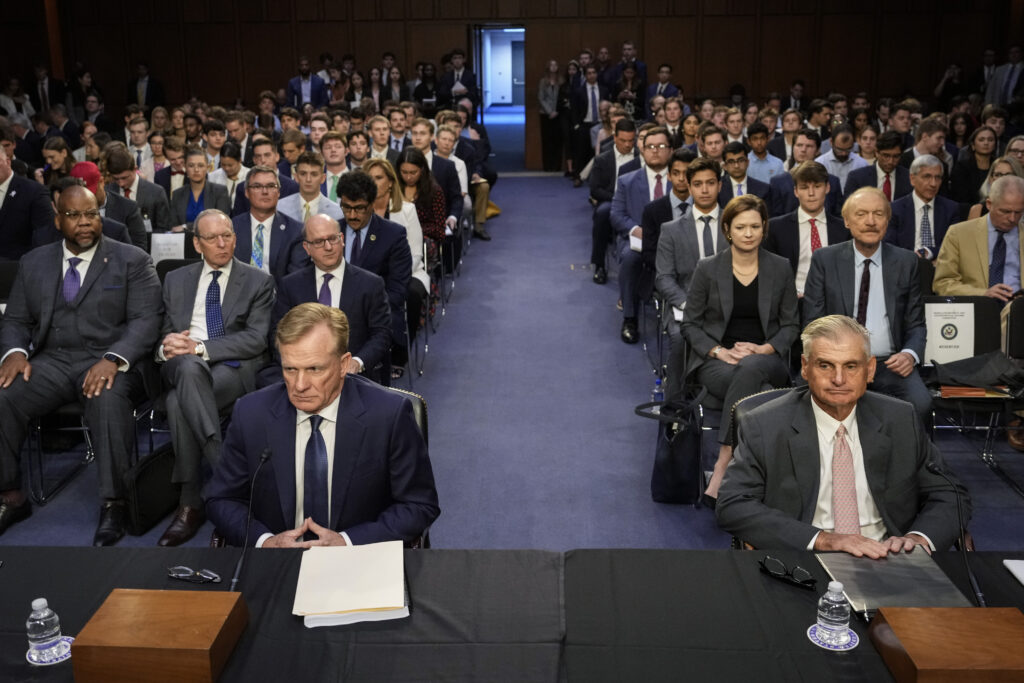 Chief Operating Officer of the PGA Tour Ron Price and PGA Tour Policy Board member Jimmy Dunne take their seats in a hearing between the PGA Tour and the PIF of LIV Golf