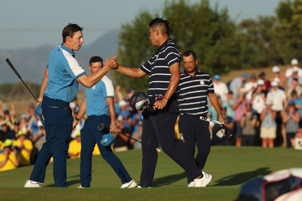 Matt Fitzpatrick and Collin Morikawa on the 15th green following their Friday afternoon fourball matches at the Ryder Cup at Marco Simone