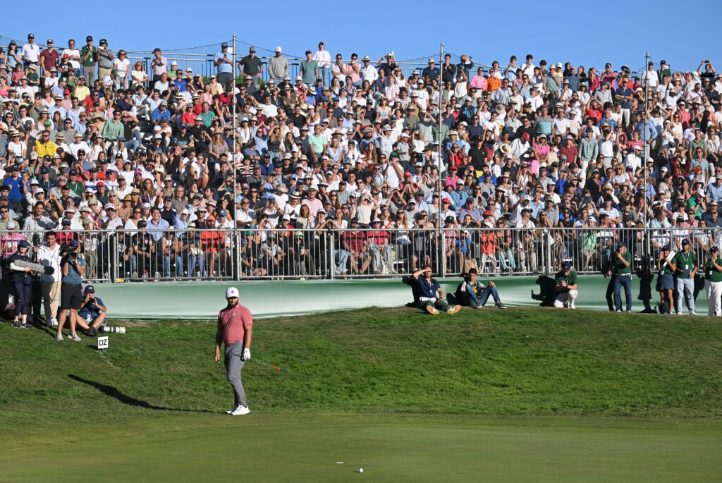Jon Rahm of Spain reacts after he putts on the 18th hole green playoff on day four of the acciona Open de España