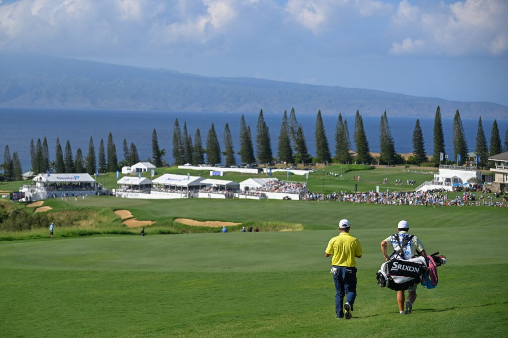 Hideki Matsuyama walks down the 18th hole during the final round of The Sentry in 2025